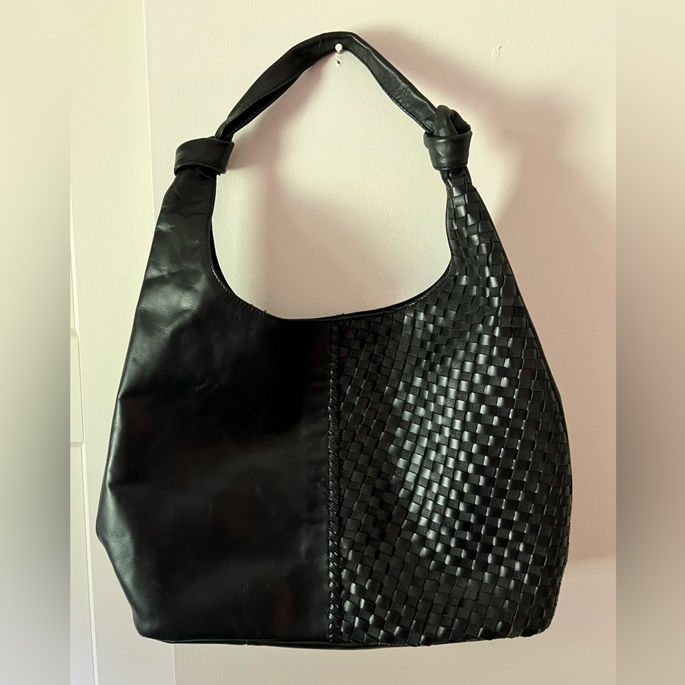 Black leather shoulder bag.